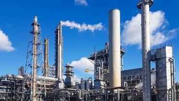 Industrial ammonia and hydrogen processing facility with multiple towers